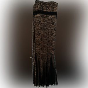 Bagdley Mishka black lace dress with neutral lining.  Size 8 built in bra.